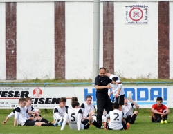 Halbzeitansprache mit kuriosem Wandtattoo