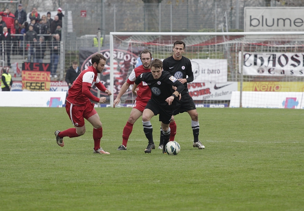 Gallus, im Hintergrund Becker